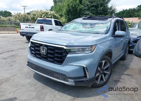 2023 Honda Pilot Awd Elite z USA, uszkodzony, nr VIN 5FNYG1H87PB010180